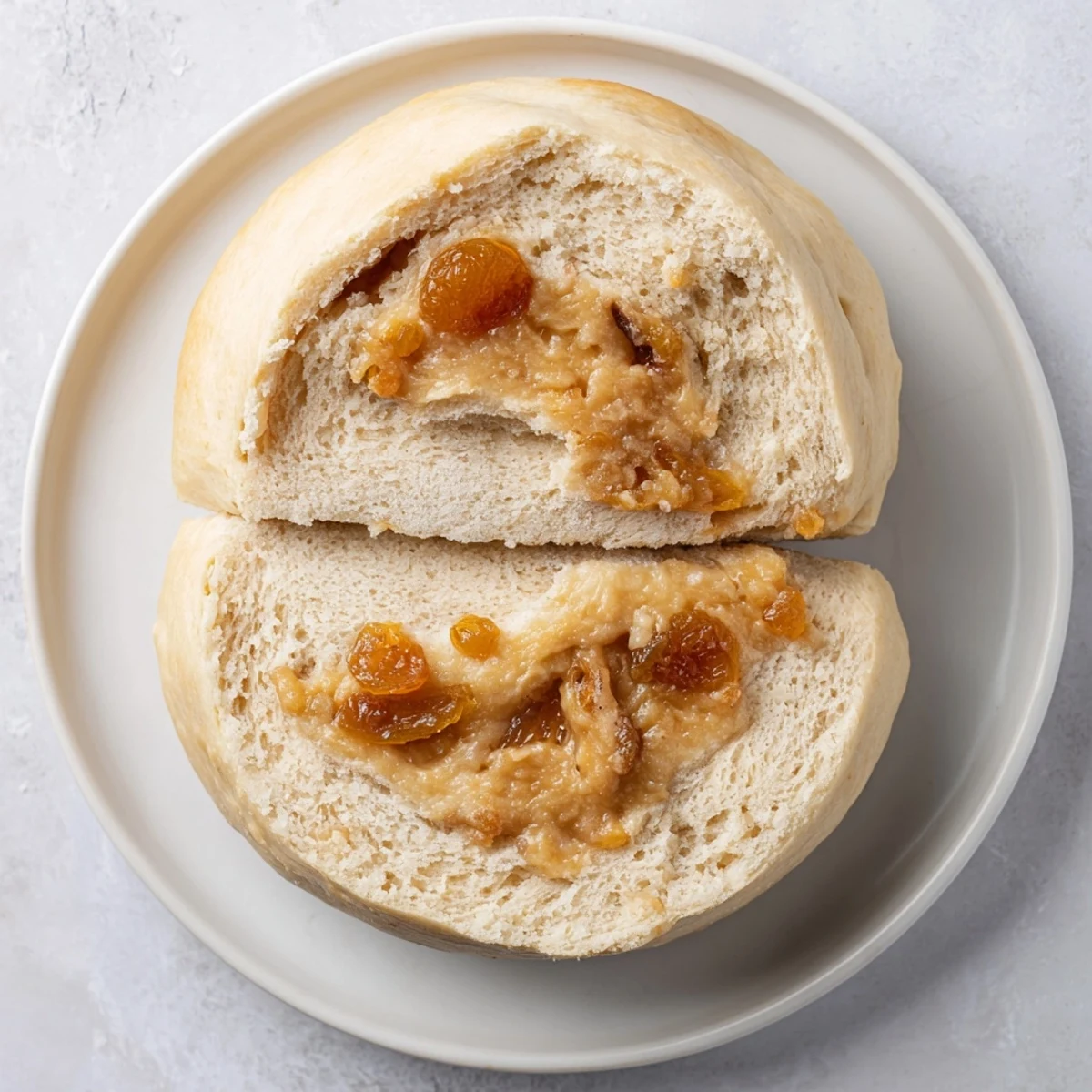 Deliciously toasted Homemade Cinnamon Swirl Raisin Bread, perfect with butter or cream cheese for breakfast.