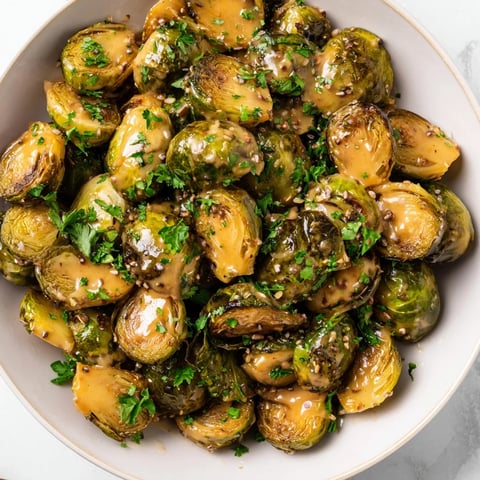 Honey Mustard Glazed Brussels Sprouts: Golden and caramelized, a perfect side dish glistening with glaze.